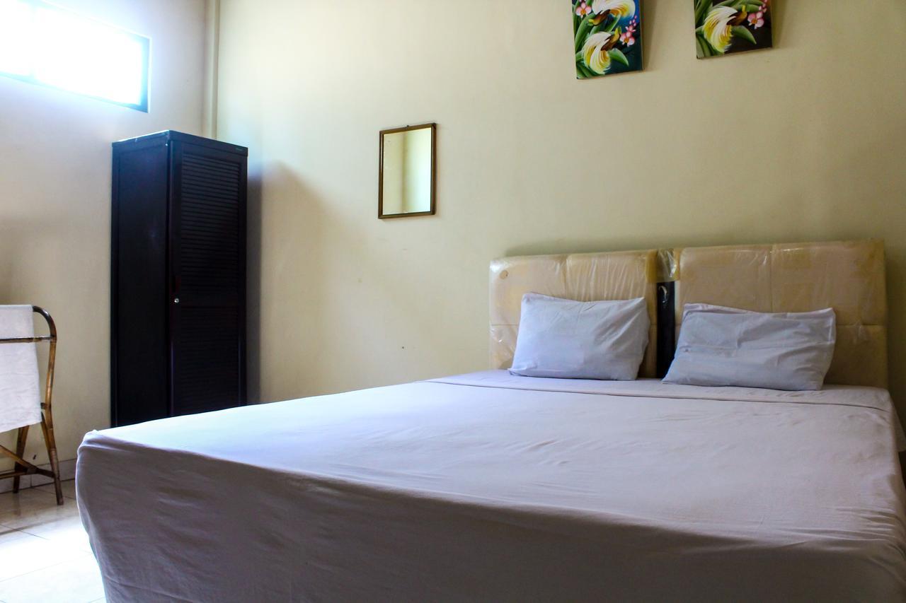 Lolo Beach Inn Легиан Экстерьер фото