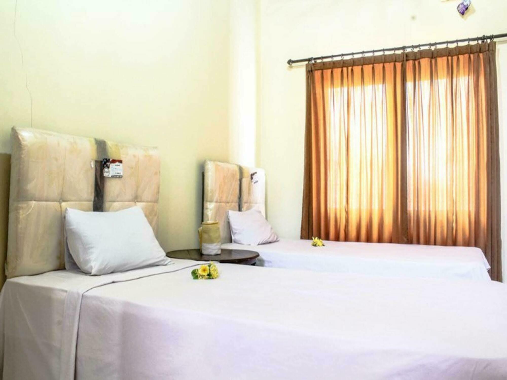 Lolo Beach Inn Легиан Экстерьер фото